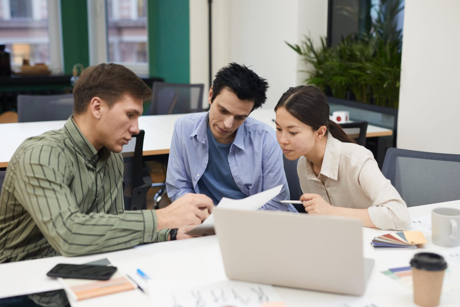 Three solicitors discussing legal services Potters Bar