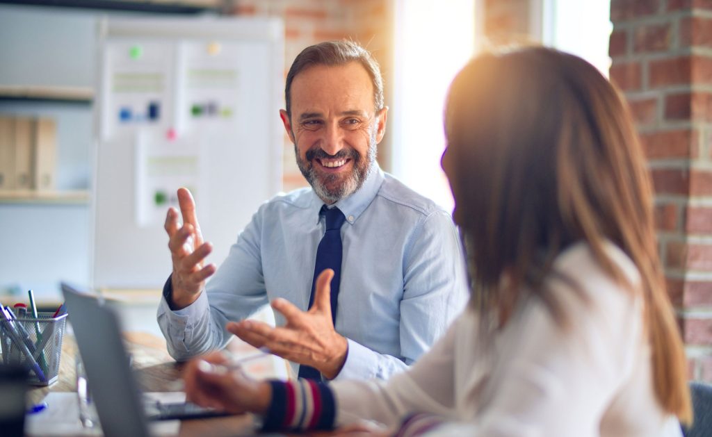 A business solicitor offering advice to his client