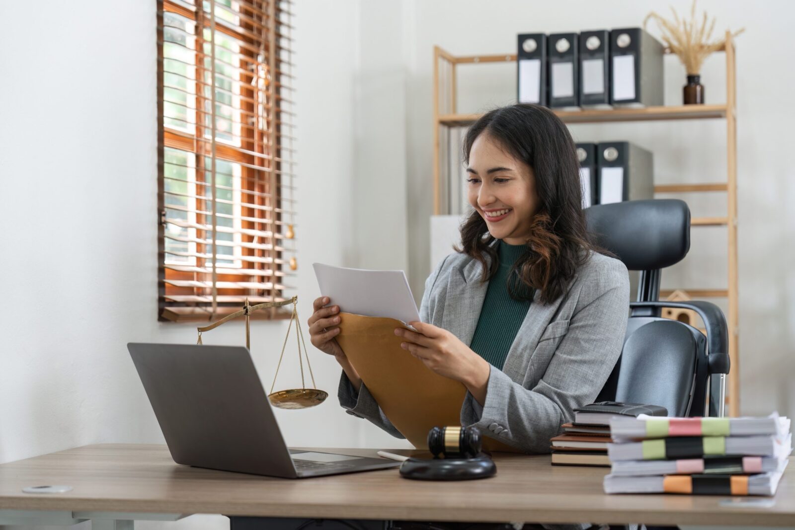 A solicitor reading a guide to selling a property