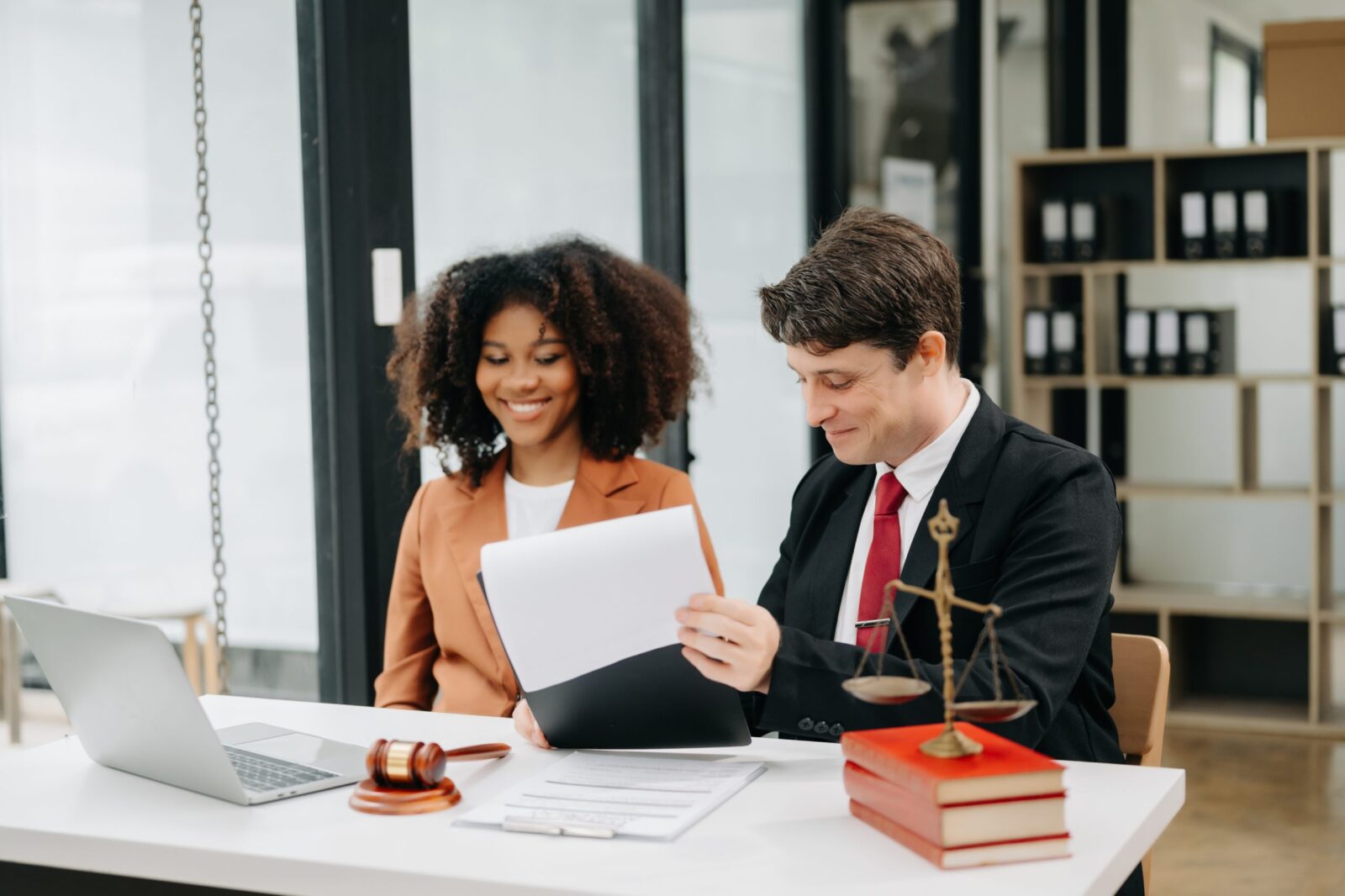 A solicitor explaining the terms and conditions with a client
