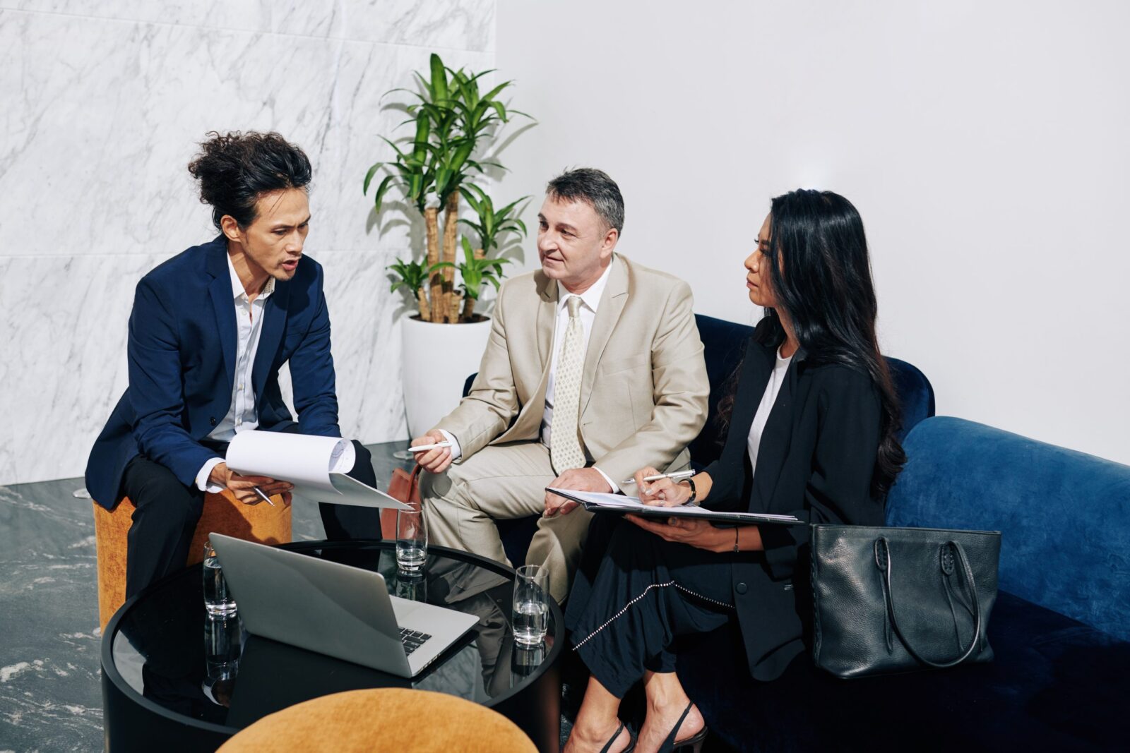 Three Wills and Inheritance solicitors having a discussion