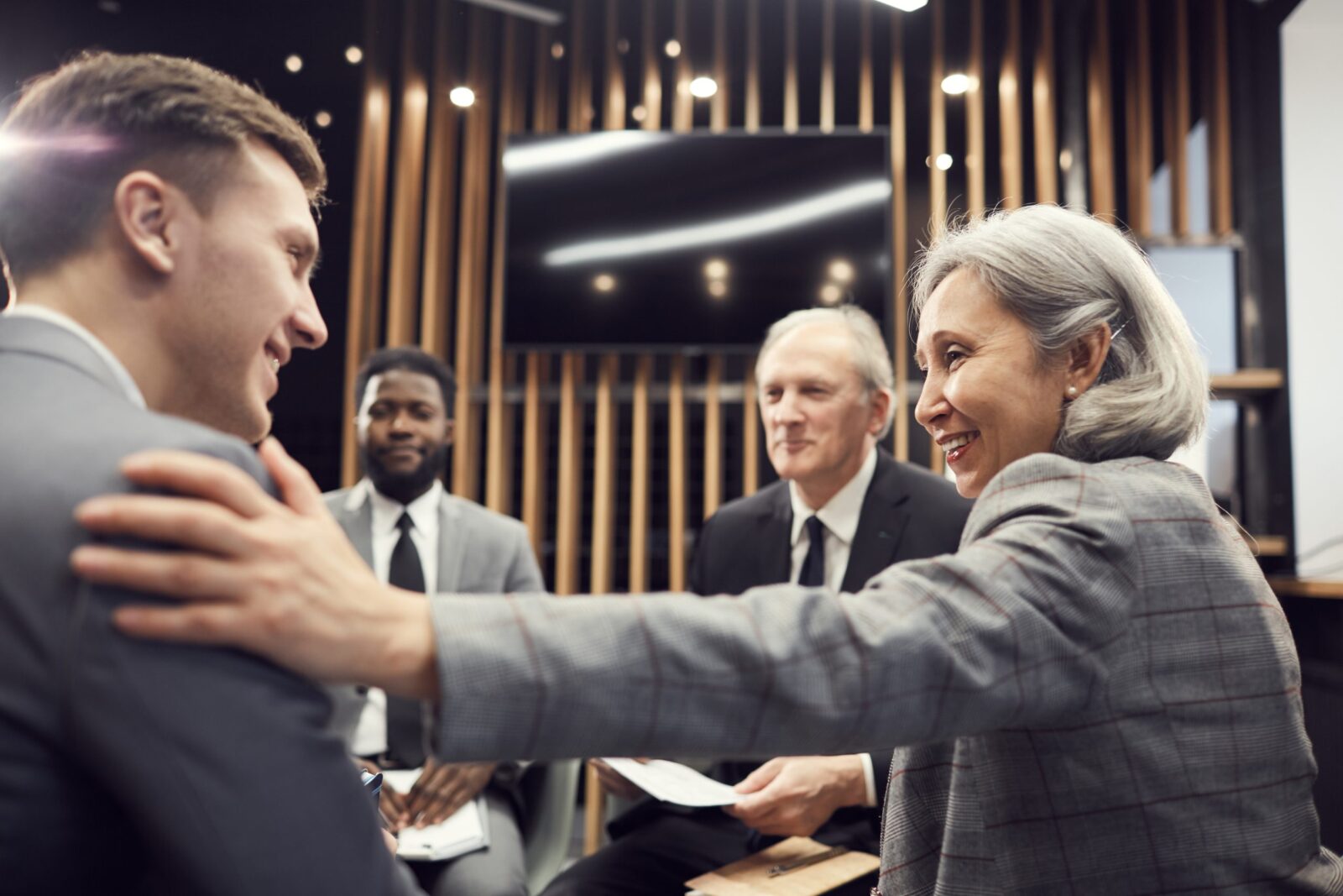 Four solicitors discussing employment law