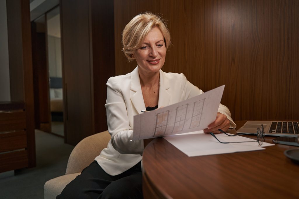 A woman reading about later life and how to be prepared
