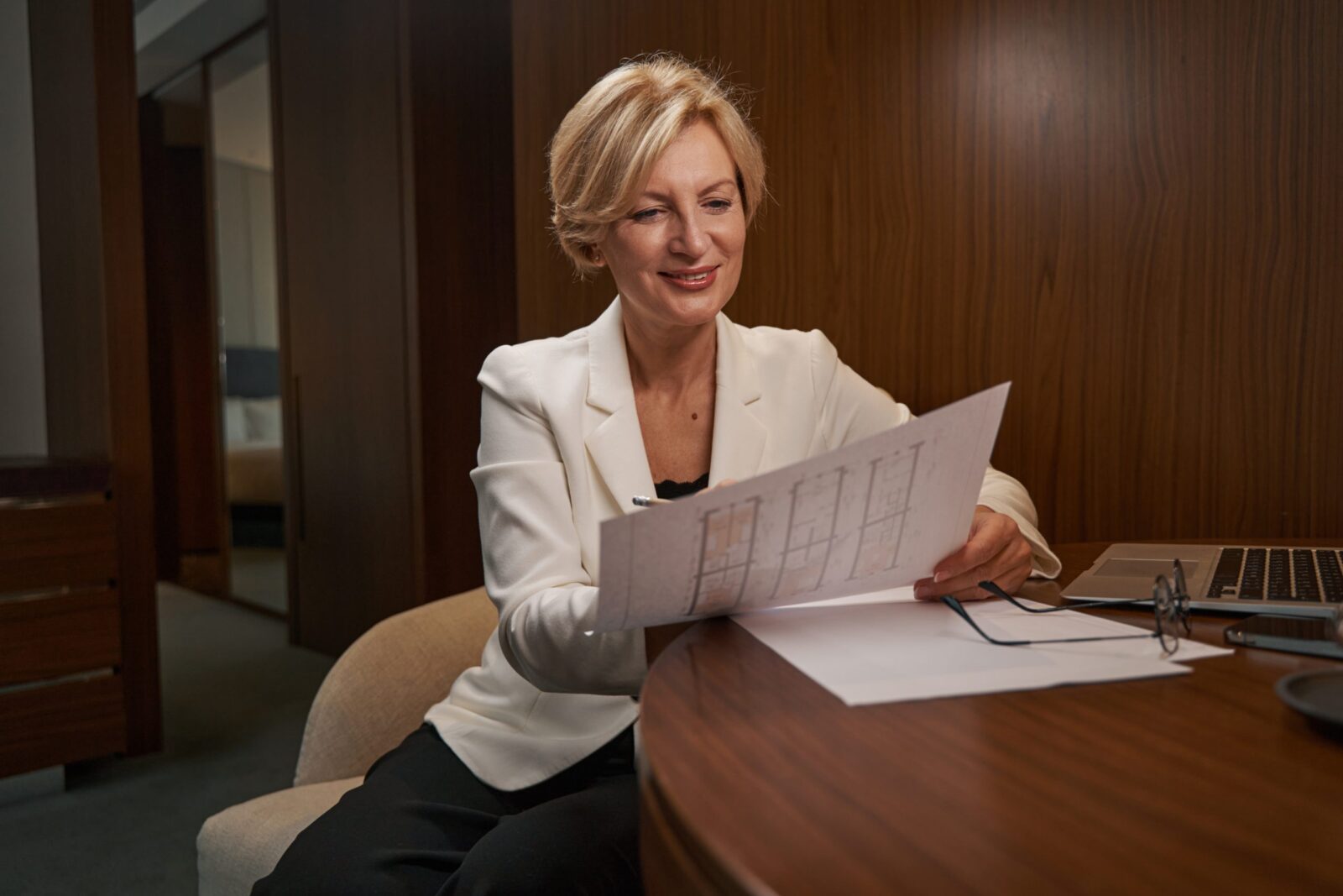 A woman reading about later life and how to be prepared