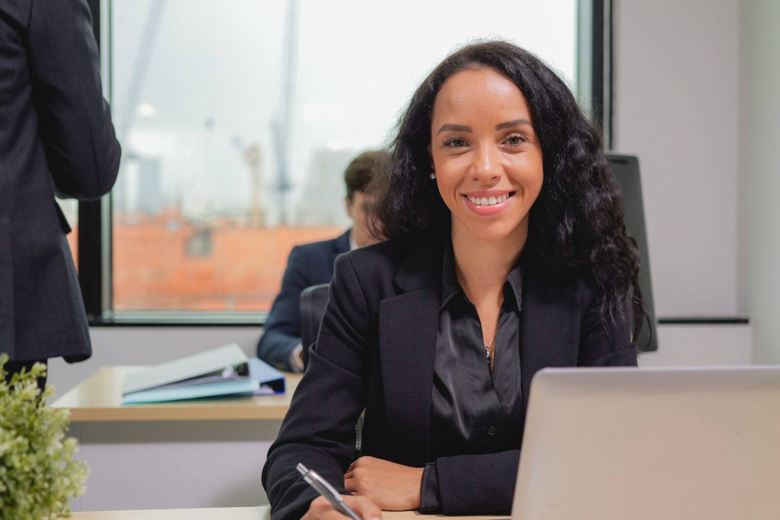 A smiling solicitor explaining Variation of Maintenance