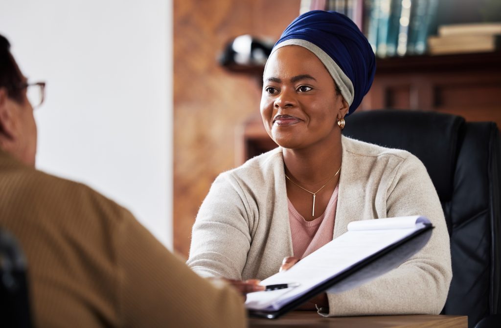A solicitor explaining commercial leases and tenancies to their client